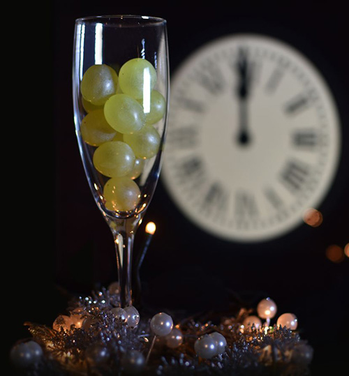 In Spain, people celebrate New Year's by eating 12 grapes at midnight.